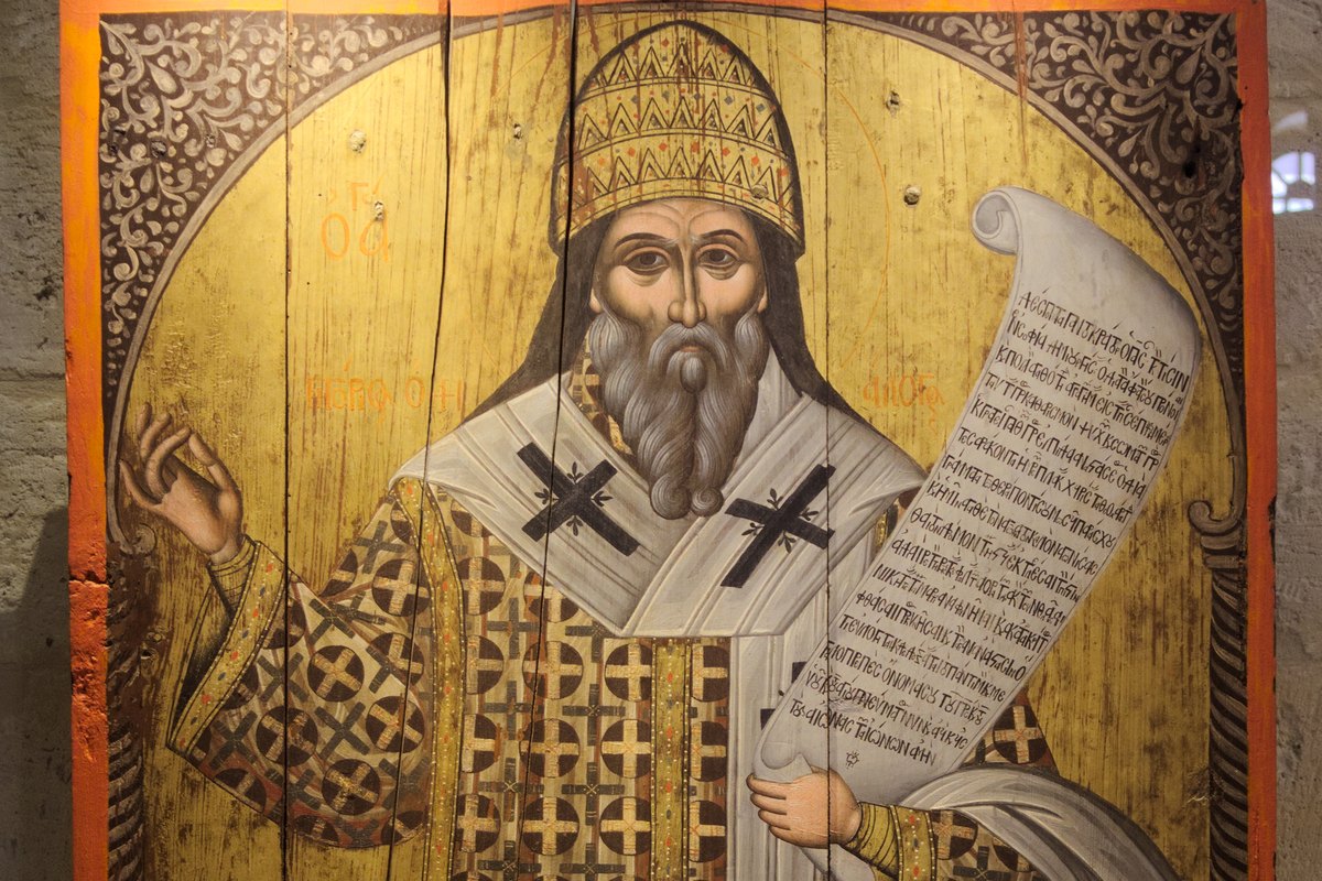 A Cretan icon of Pope Gregory the Great with a papal tiara, blessing with one hand and holding an open scroll.